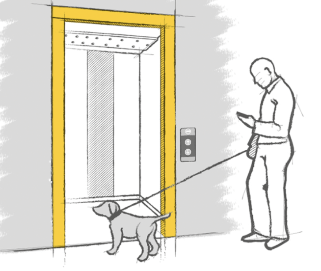 Man going in the lift with a dog